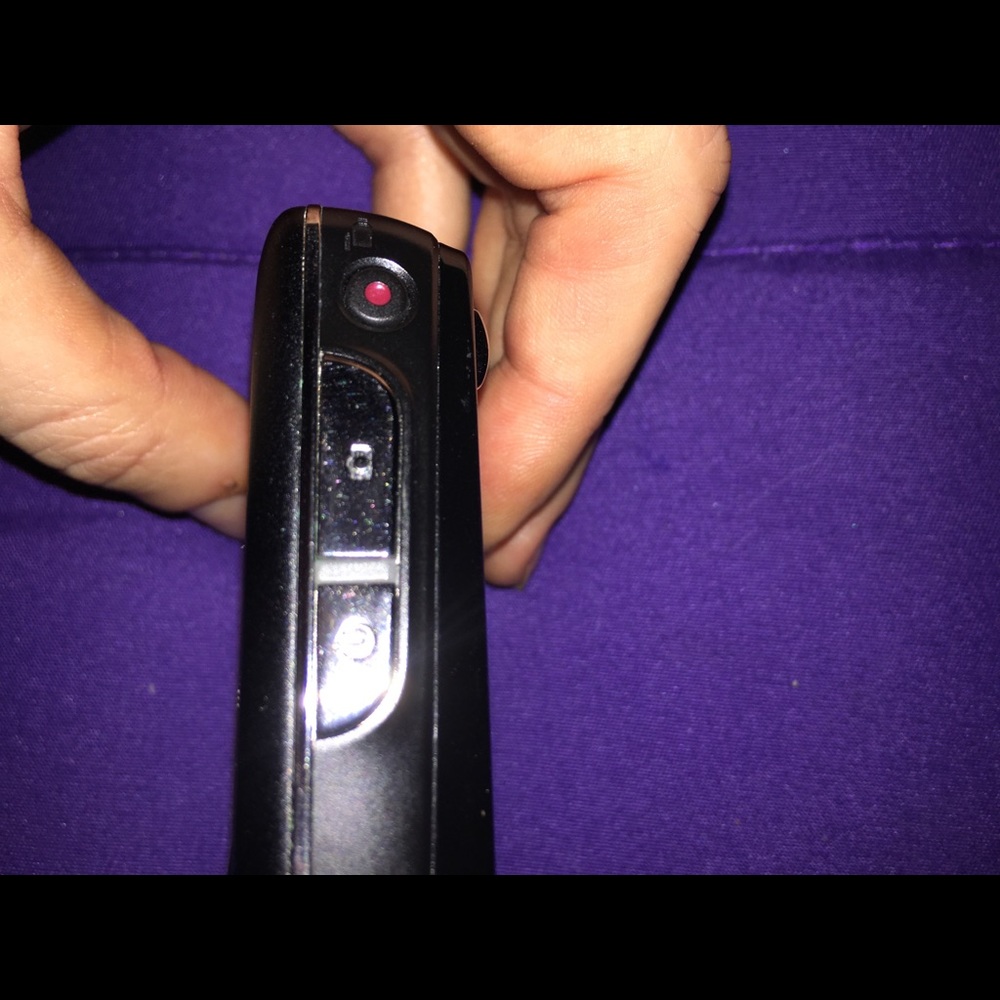 Black, barely used digital camera.